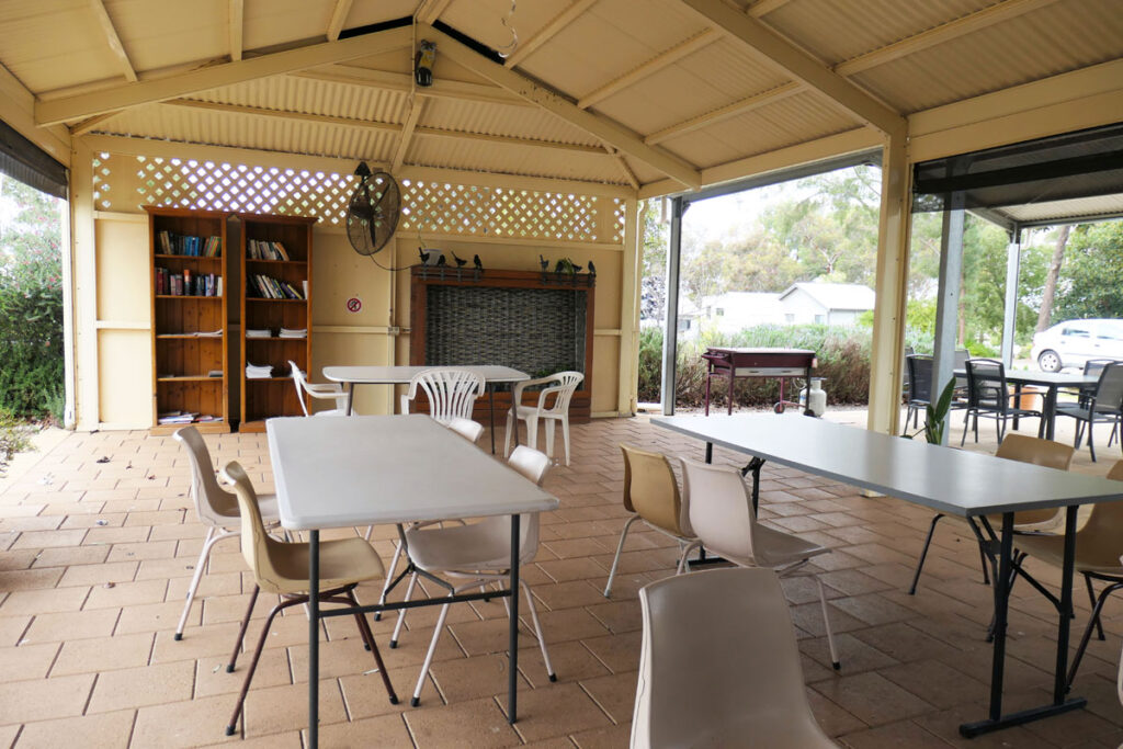 Camp kitchen with library at Kapunda Tourist Park