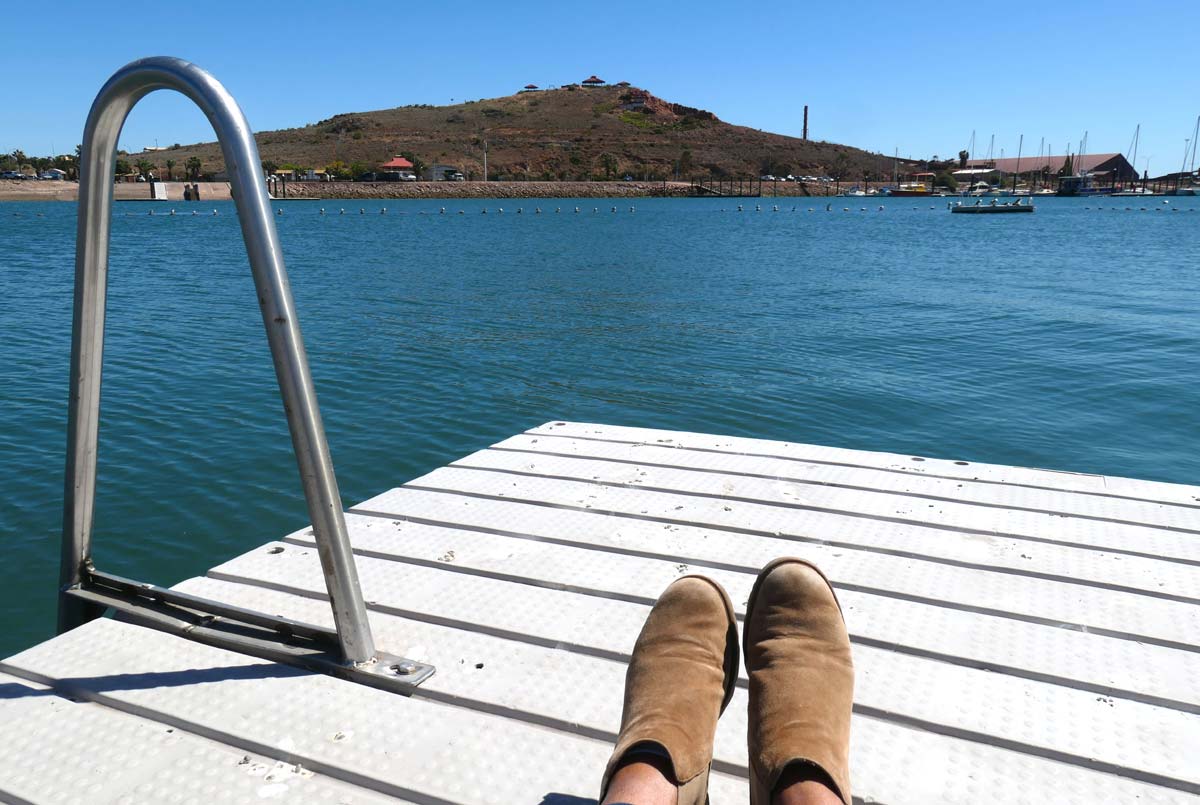 Me sitting on the floating pontoon in the enclosed swimming area of the Whyalla Marina. Eyre Peninsula, South Australia