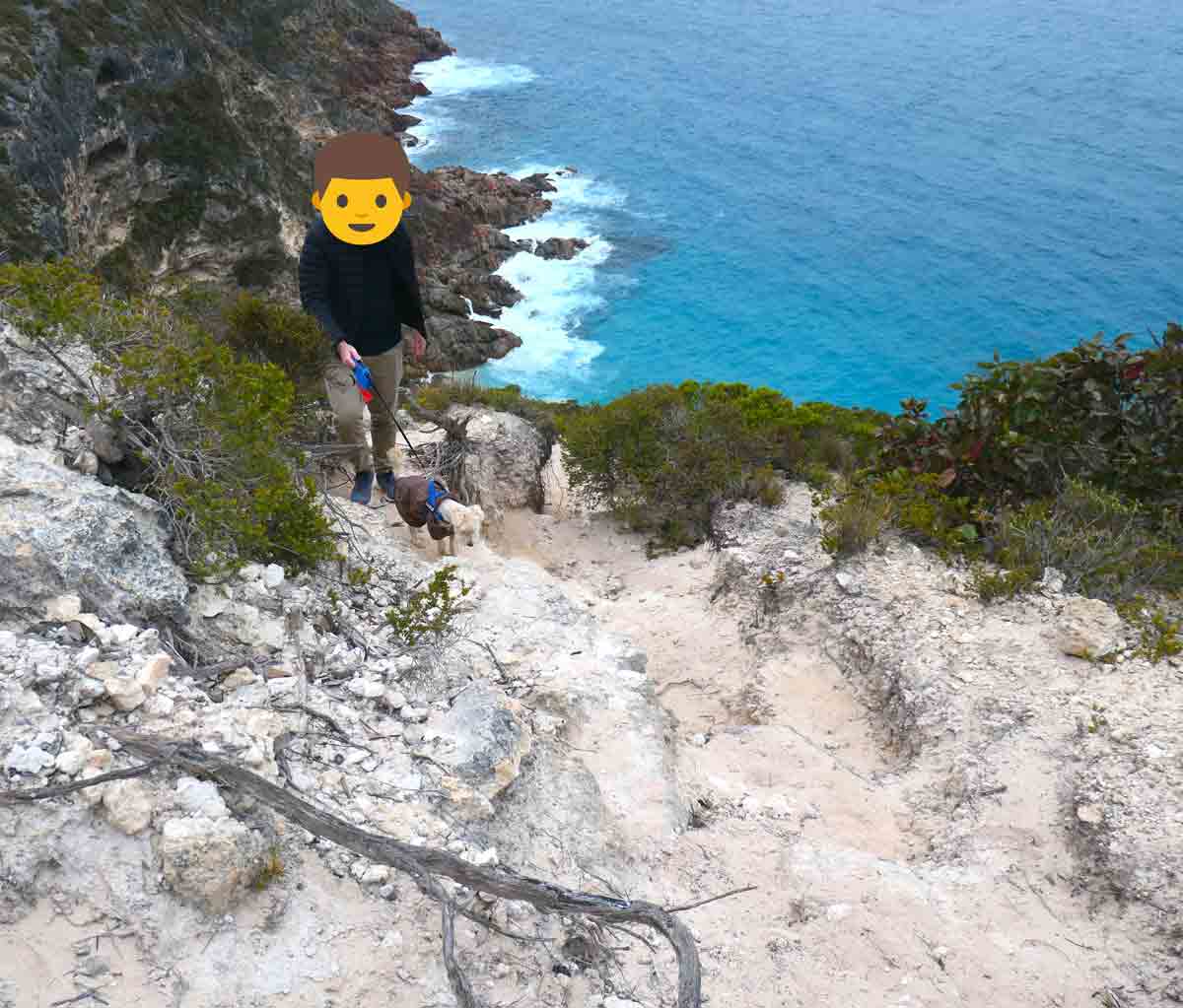 Charlie & hubby walking up the side of the cliff at Try Works Cliff / Calson's Cove, showing the crumbly track. Located in Whaler's Way Sanctuary, Eyre Peninsula, South Australia.